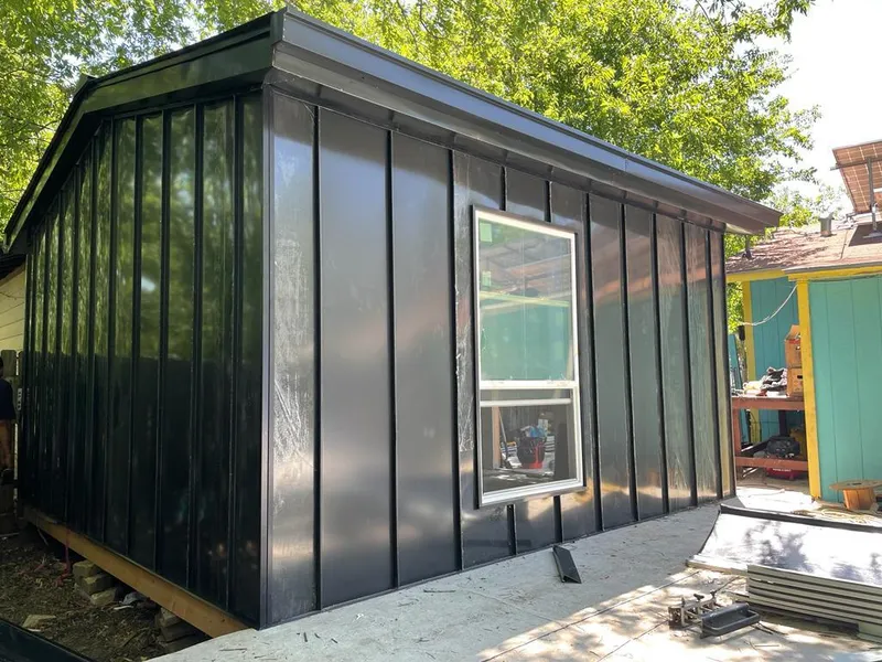 Black standing seam metal wall panels for Roof Inspection in Harriman